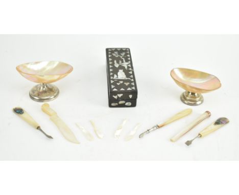 A collection of vintage mother of pearl inlaid items, MOP handled items and trinket dishes. The lot to comprise a Chinese lac
