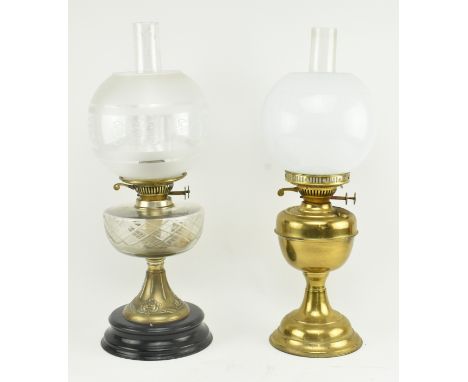 Two vintage 20th century Duplex oil lamp lights. One having a frosted glass shade supported by brass stem with embossed Art N