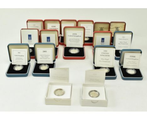 Royal Mint - a collection of Silver Proof Piedfort One Pound Coins, all cased and majority complete with certificate. Compris