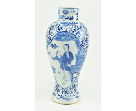 A 20th century Chinese Kangxi blue and white porcelain figurine vase. The vase depicting the tale of Sanniang Jiao Zi -&nbsp;