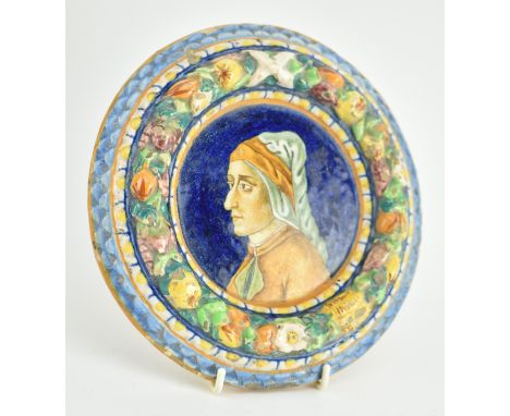 An Italian hand painted portrait of a lady ceramic wall plate. The portrait surrounded by three rings of flowers. Measures ap