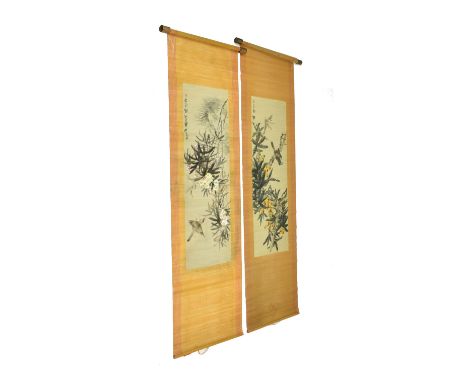Two mid 20th century Chinese ink and colour painting natural fabric scrolls. This lot comprising a scroll depicts a scene of 