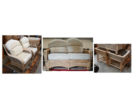 A cane and wicker-rattan conservatory suite comprising a two-seater sofa, 150 cm x 80 cm x 100 cm h, a pair of matching armch