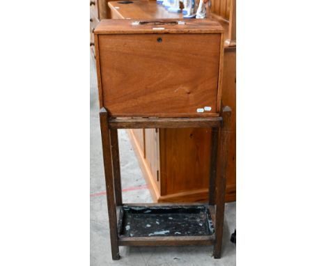 An oak engineer's tool-chest fitted with eight drawers, 43 cm wide to/w an oak stick-stand (2)