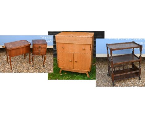 An oak three-tier drinks trolley to/w a teak side cabinet, sewing table (and contents) and a three-drawer bedside chest (4)