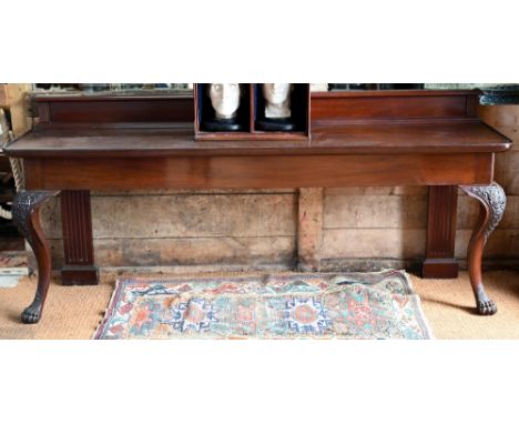 A Victorian country house mahogany console or silver table, the rectangular dished top with upstand, over a plain frieze and 