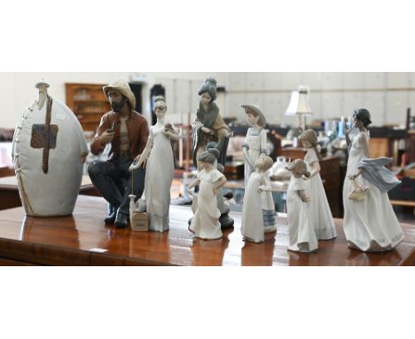 Three Lladro figures to/w six Nao figures and a pottery figure of an Asian gentleman (10) 