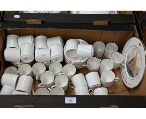 A catering set of forty gilt-rimmed china coffee cans and saucers, to/w a Wedgwood ltd edition plate for the Royal Thames Yac