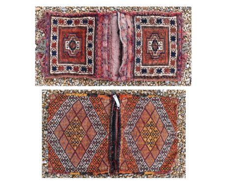 Two old Kurdish/Turkish carpet face double saddle bags, with kelim backs, 100 cm x 60 cm / 103 cm x 46 cm (2)