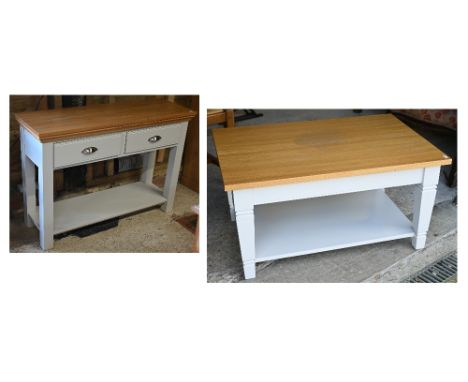 A modern coffee table with painted base, 92 cm x 60 cm x 46 cm to/w a matching console/hall table with two drawers, 105 cm x 