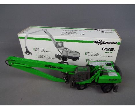 Conrad - A boxed Conrad #2845 1:50 scale Sennebogen 835 Green Line Material Handler. The model appears to be in Near Mint con