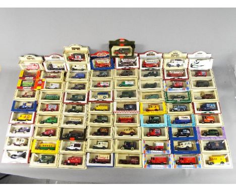 Lledo - A boxed collection of 74 diecast vehicles by Lledo. Lot includes #49004 AEC Renown Bus - Jantzen Swimwear; #3006 1939