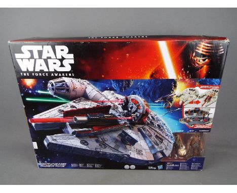 Star Wars - a Star Wars The Force Awakens Millennium Falcon by Hasbro with Nerf Guns model No. B3678 in original factory seal