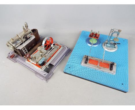 Wilesco - An unboxed Wilesco D16 Steam Engine with Workshop. Both items have varying degrees of play wear but overall appear 