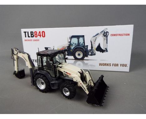 NZG - A boxed diecast 1:50 scale NZG #867 Terex TLB840 Backhoe Loader. The model in grey and black appears to be in Near Mint