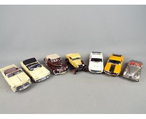 Danbury Mint - seven unboxed 1: scale diecast model motor vehicles comprising a 1941 Chevrolet convertible (limited edition),