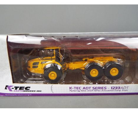 Motorart - A boxed 1:50 scale Motorart #15826 K-Tec ADT Series 1233 Scarper with Volvo A40F Articulated Dump Truck. The set a