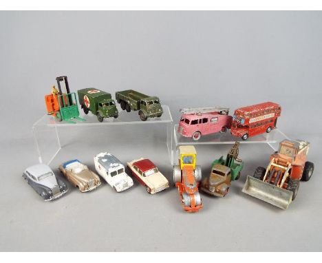 Dinky by Meccano - a collection of twelve unboxed diecast models to include 10 ton Army truck # 622, Military Ambulance # 626