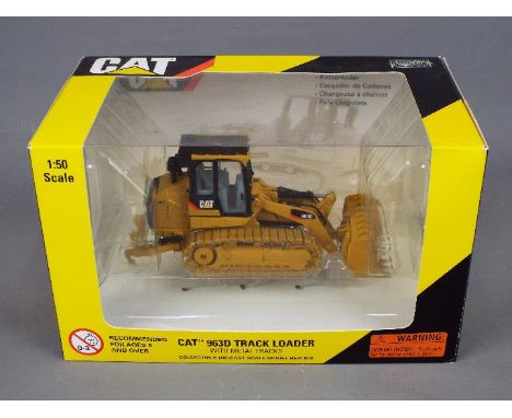 Norscot - A boxed 1:50 scale diecast Norscot #55194 Caterpillar 963D Track Loader. The model appears to be in Mint condition 