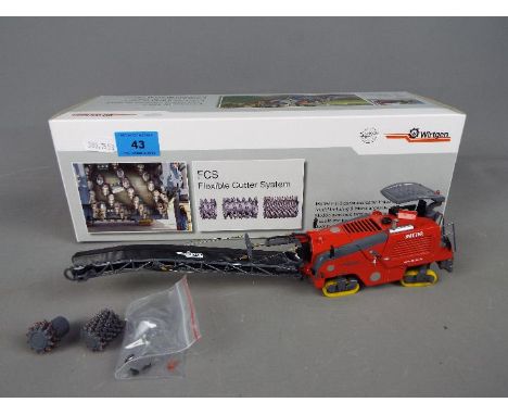 NZG - A boxed diecast 1:50 scale NZG #763/01 Wirtgen W100f Cold Milling Machine. The model in red and grey appears to be in M