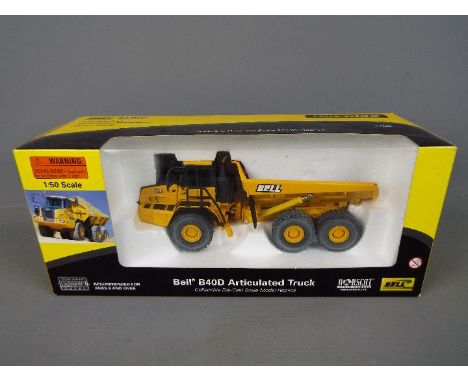 Norscot - A boxed 1:50 scale diecast Norscot #57502 Bell B40D Articulated Truck . The model appears to be in Mint condition p