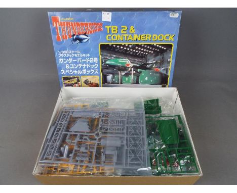 Gerry Anderson - Thunderbirds - a Happinet all plastic model kit of Thunderbird TB 2 &amp; container dock, model No. 033135-4