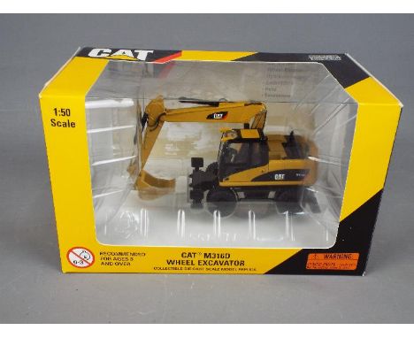 Norscot - A  boxed 1:50 scale diecast Norscot #55171 Caterpillar M316D Wheel Excavator. The model appears to be in Mint condi