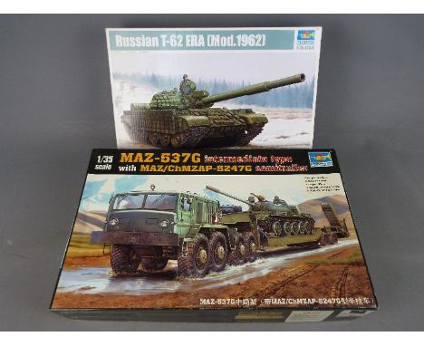 Two Trumpeter 1/35 scale boxed kits comprising MAZ-537G with MAZ/ChMZAP-5247G tractor and tank transporter # 00211, and Russi