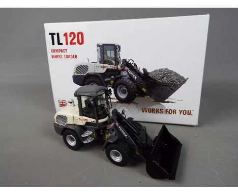 NZG - A boxed diecast 1:50 scale NZG #903 Terex TL120 Compact Wheel Loader. The model in grey and black appears to be in Mint