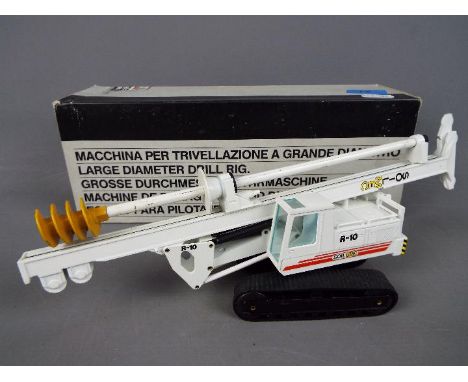 NZG - A boxed diecast 1:50 scale NZG #358 Solimec R-10 Large Diameter Drilling Rig. The model in white appears to be in Excel