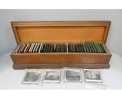 A box of forty Victorian era magic lantern slides 