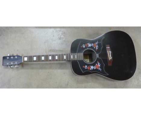 A K-500 Guitar with a soft case 