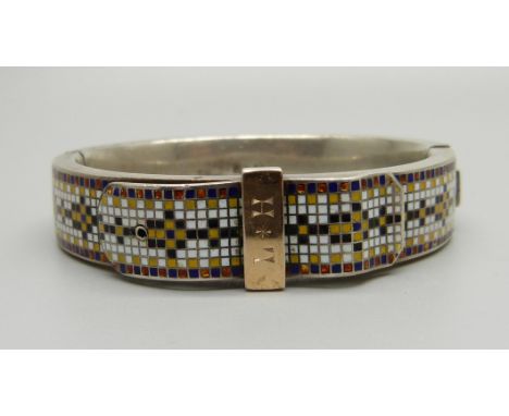 A continental white metal and checkered enamel buckle bangle, marked 'MuS4' 