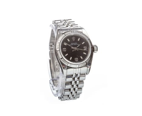 LADY'S ROLEX OYSTER PERPETUAL STAINLESS STEEL AUTOMATIC WRIST WATCH, the round black dial with applied Arabic numerals and ba