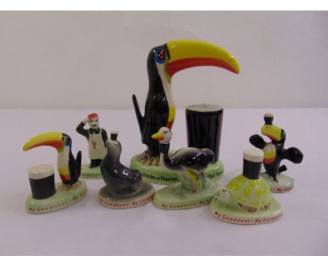 A quantity of Carltonware Guinness figurines to include toucans ,an ostrich, a tortoise, a seal and a brewer (7)