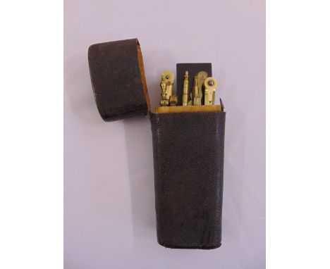A leather cased W &amp; S Jones brass architect set circa 1800 to include dividers, rules and a compass