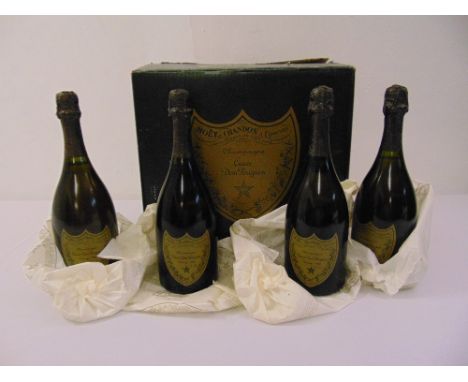 Four Dom Perignon vintage 1980 75cl bottles and an original Dom Perignon packaging box