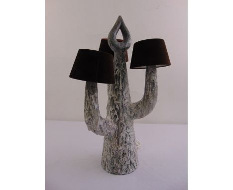 A 1970s three branch German style ceramic table lamp in the form of a stylised cactus with detachable shades