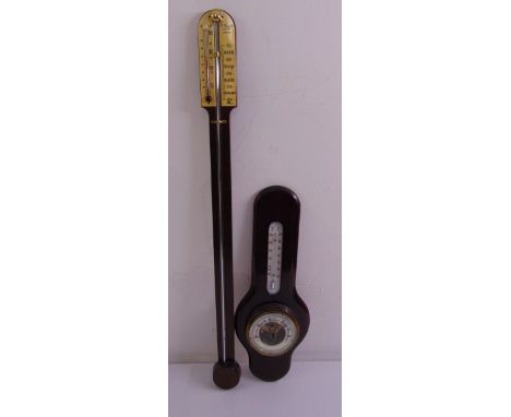 A reproduction brass mounted stick barometer by A Comitti and Son and an early 20th century barometer with enamel dials