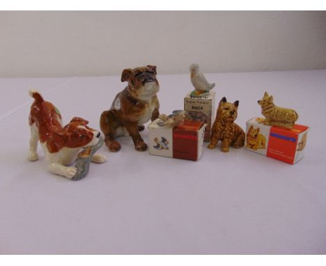 Six ceramic figurines of animals to include Beswick, Wade and Hutschenreuther