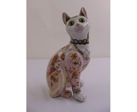 Galle signed ceramic figurine of a cat with green glass eyes, A/F