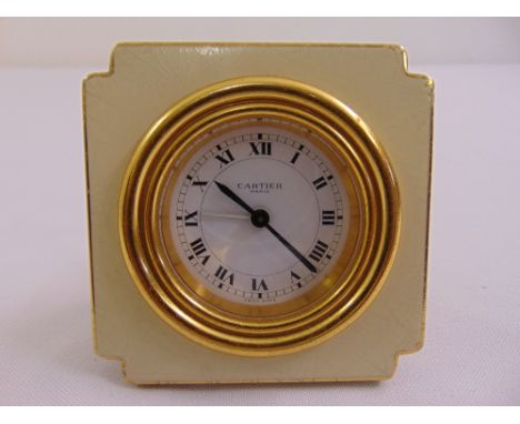 Cartier of Paris desk clock rectangular with incuse corners, white enamel dial, Roman numerals serial no. 7512 10803,