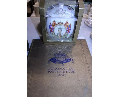 Two pieces of Commemorative ware including a Ringtons tea caddy 