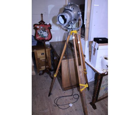 A vintage theatre lamp mounted on tripod in working order, shipping unavailable 