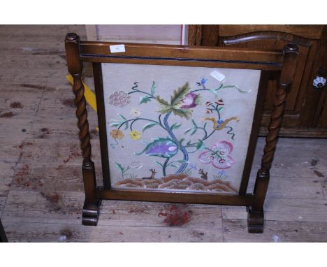 A Edwardian firescreen with embroidered central panel, shipping unavailable 