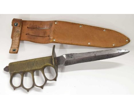 American First World War Mk I trench knife with double edged blade and brass knuckle duster grip with non-matching leather sc