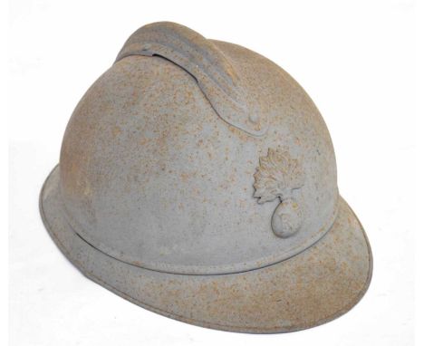 French M15 pattern Army helmet with RF infantry badge to front, and a comb on top (a/f), rust and lacking lining