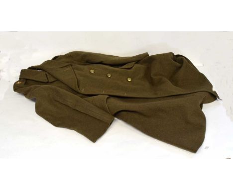 British Army greatcoat dated 1952, dismounted, 1940 pattern, size 4, with Royal Artillery buttons and metal officers insignia