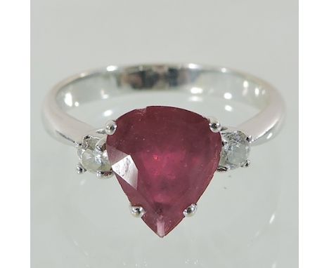 An 18 carat gold, diamond and ruby ring, boxed 