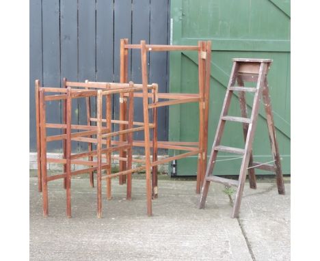 A collection of four antique towel airers, together with a small wooden step ladder, 115cm tall